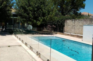 Glass pool barriers